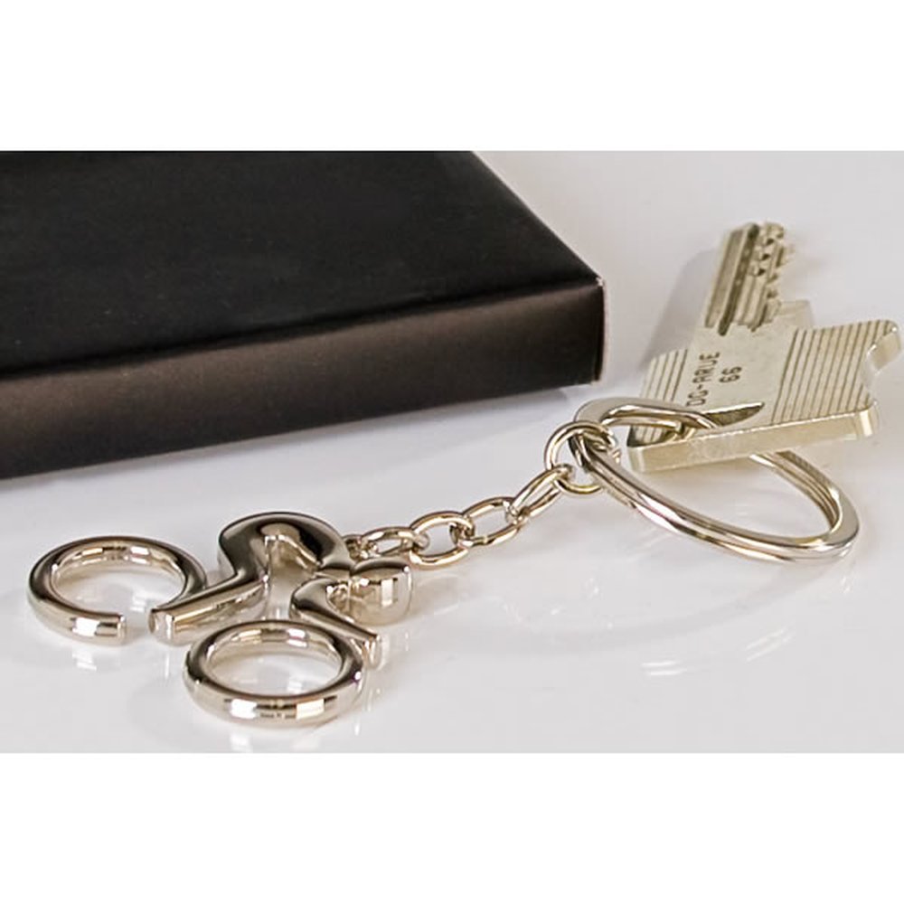 Schlüsselanhänger Biker aus Metall · silber in schwarzer Geschenkbox Länge 9 cm